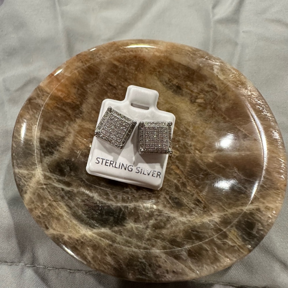 Brand new Sterling Silver earrings with screw backs. Great Christmas gift!